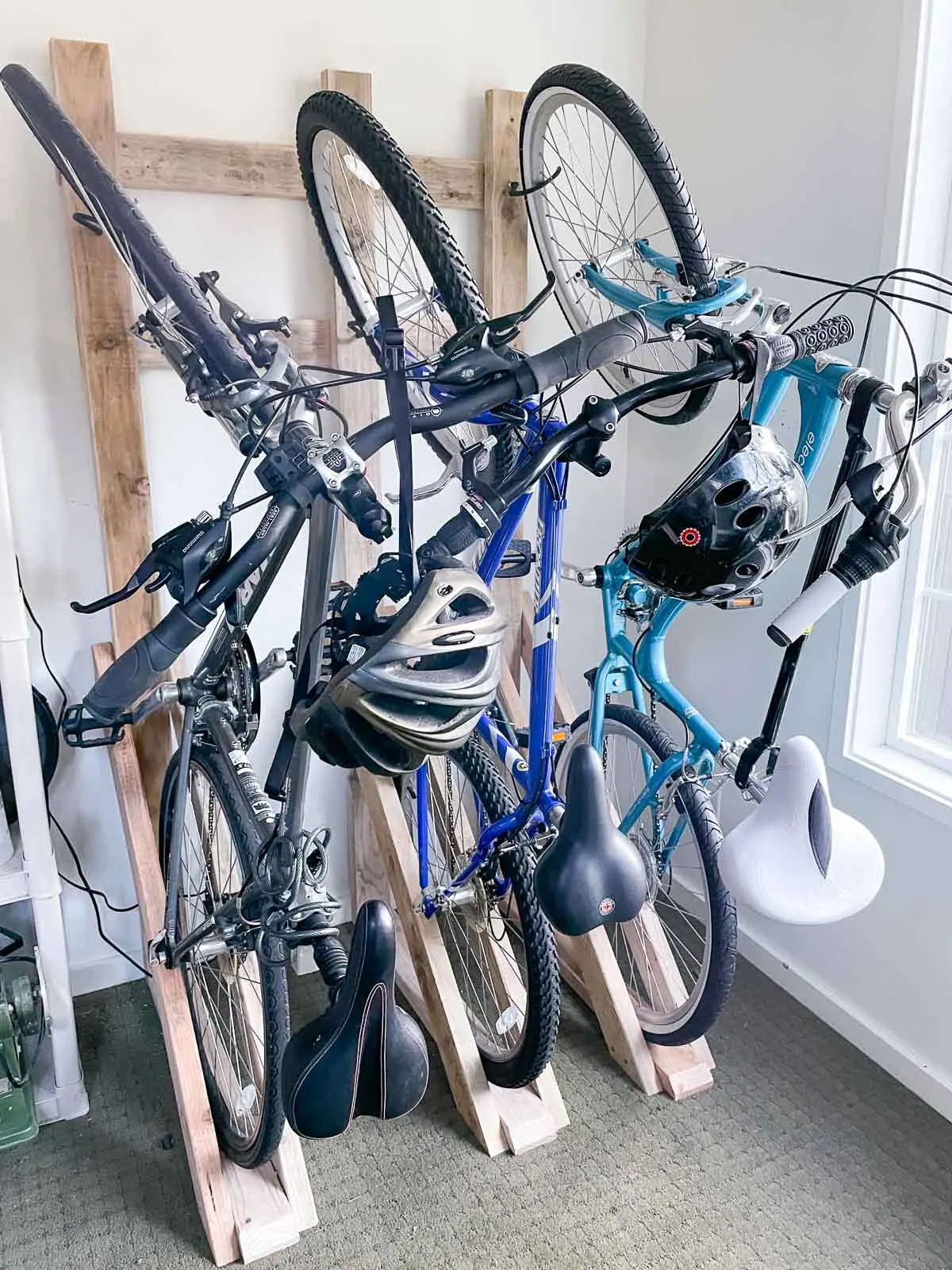 Easy DIY Wooden Wall Mount Bike Rack - The Handyman's Daughter