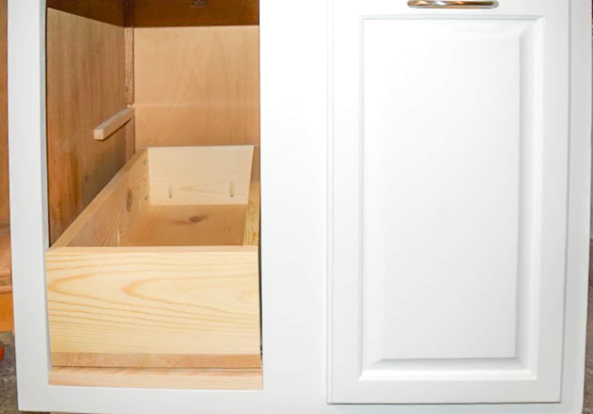 How to Add a Pull Out Trash Can to a Cabinet - The Handyman's Daughter