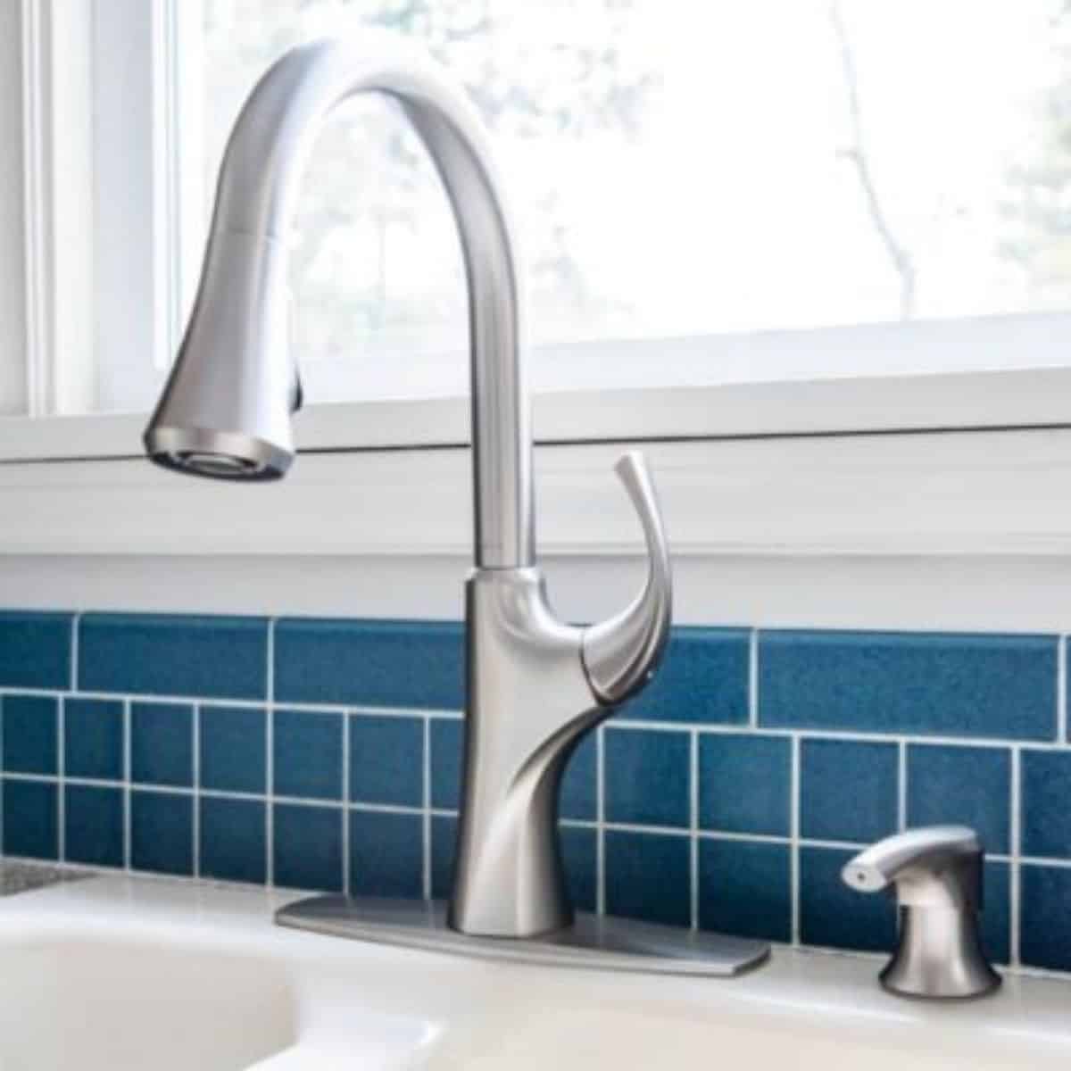 https://www.thehandymansdaughter.com/wp-content/uploads/2021/06/how-to-change-a-kitchen-faucet-The-Handymans-Daughter-1200-sq.jpg