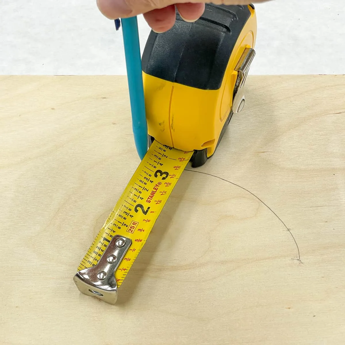 https://www.thehandymansdaughter.com/wp-content/uploads/2022/10/tape-measure-drawing-circle.jpg.webp