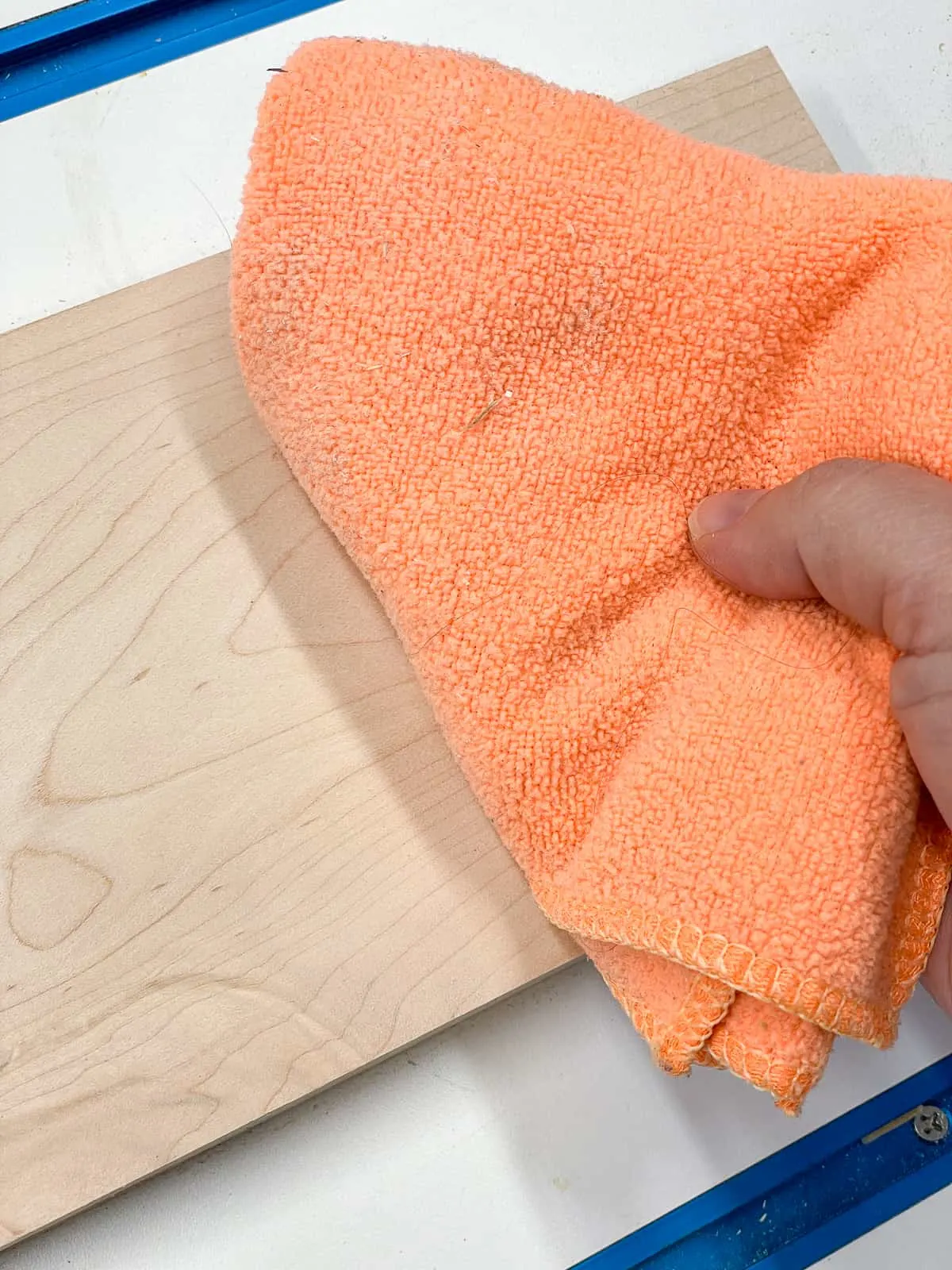 Dad Uses Tack Cloths After Sanding to Ensure a Smooth Finish 