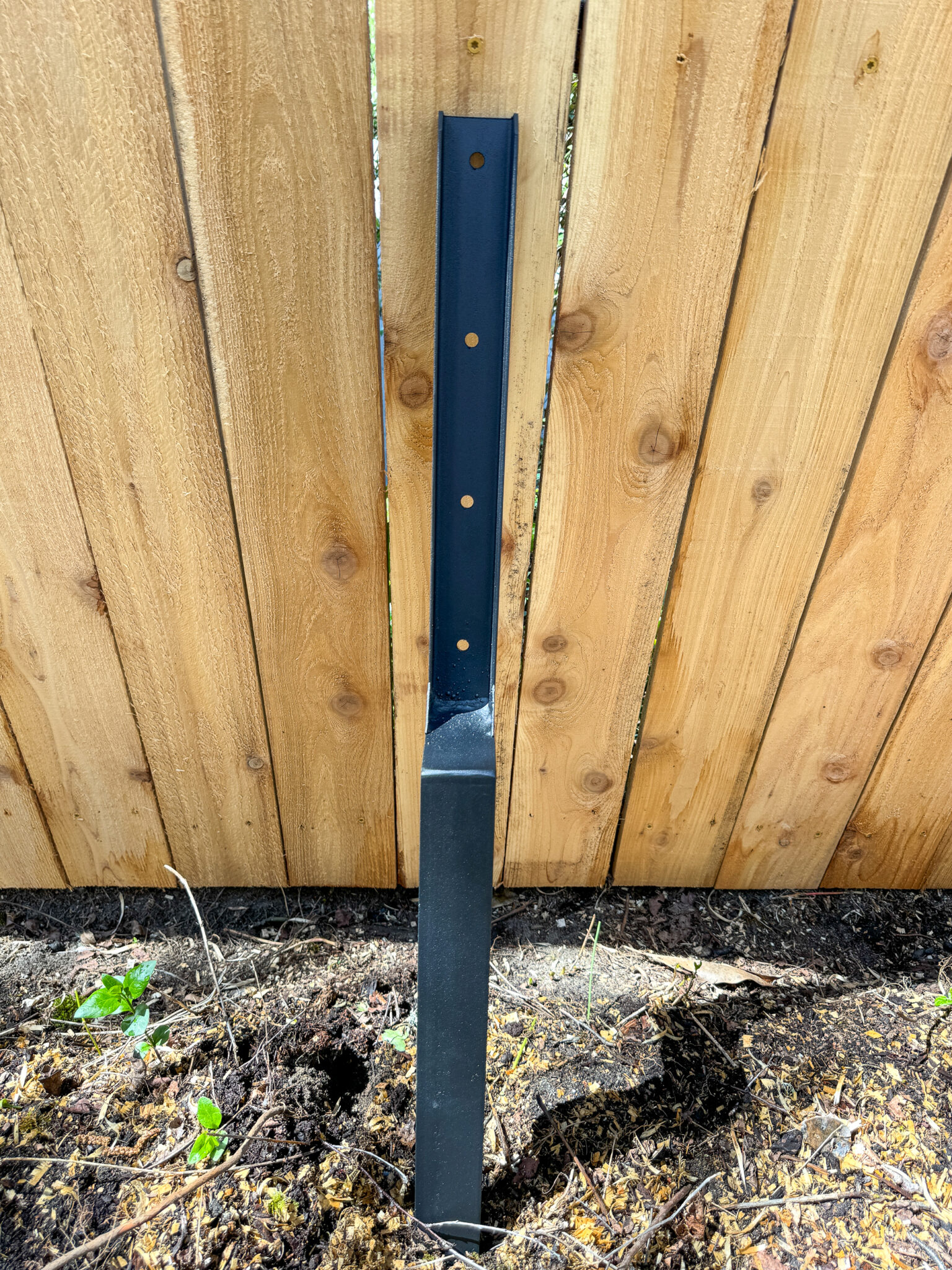 How to Fix a Leaning Fence (the LAZY way!) - The Handyman's Daughter