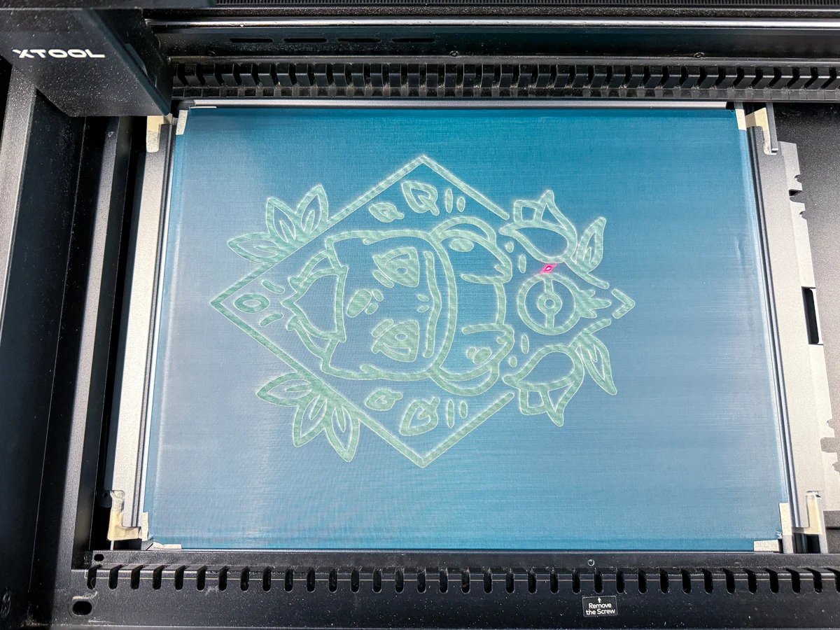 Bulbasaur design engraved on screen in xTool P2 laser