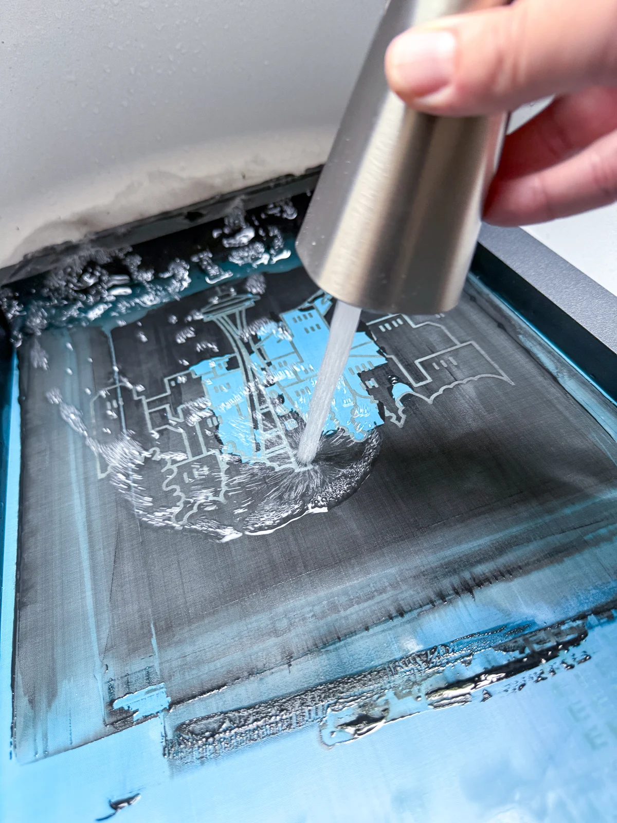 washing the ink off the screen in the sink