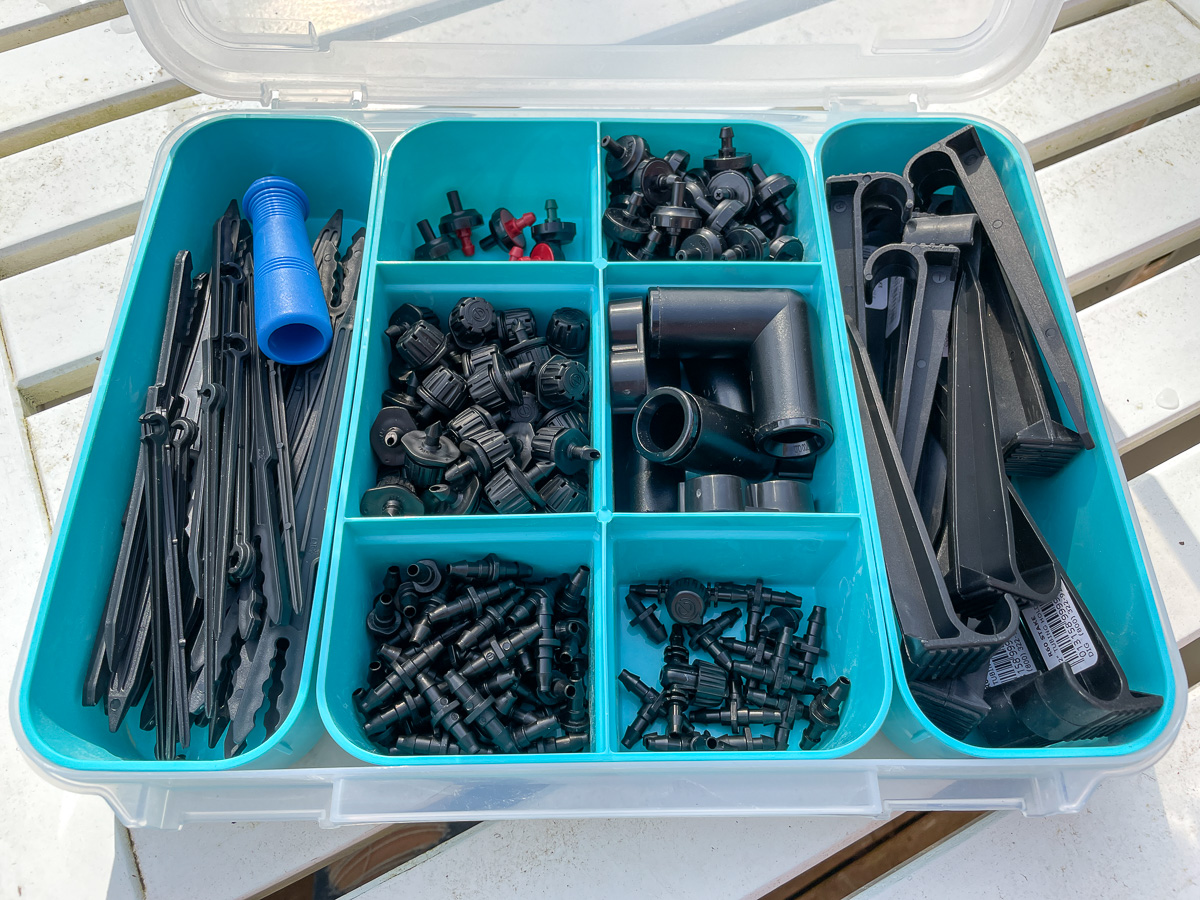 organized box of drip irrigation components