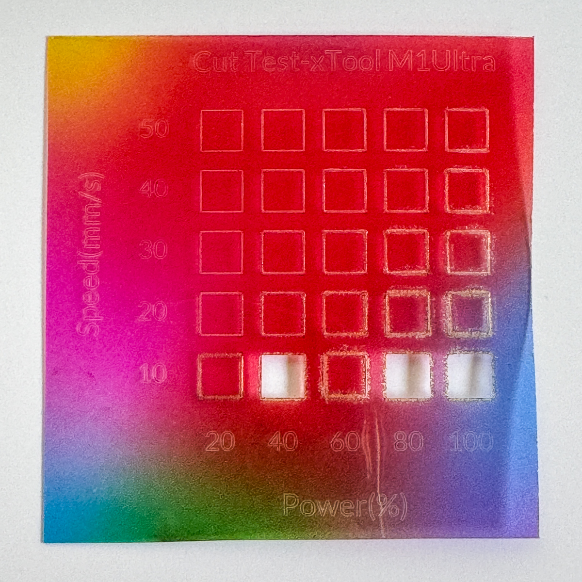 thin translucent acrylic test grid cut with the xTool M1 Ultra laser