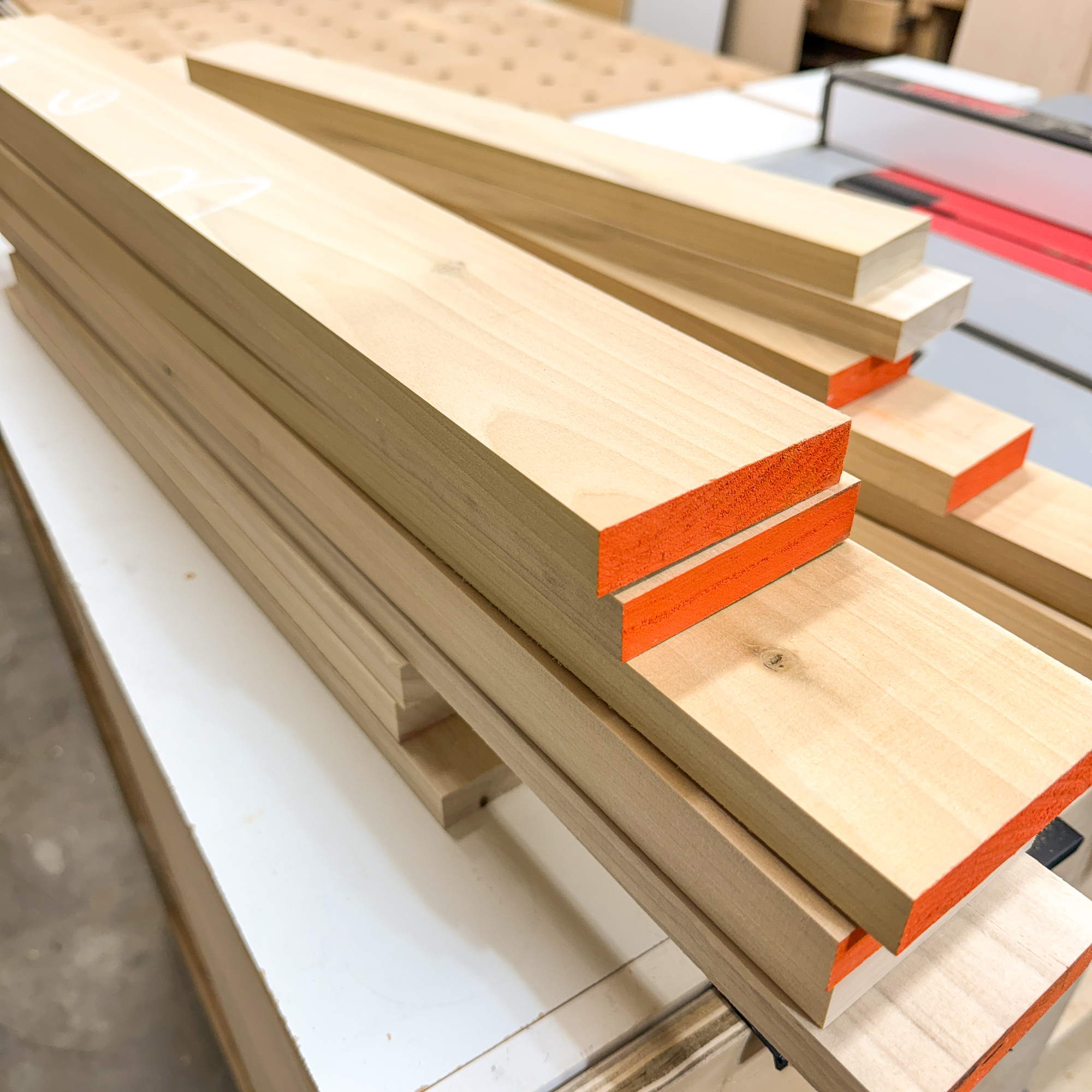 strips of lumber cut down for hexagon shelves