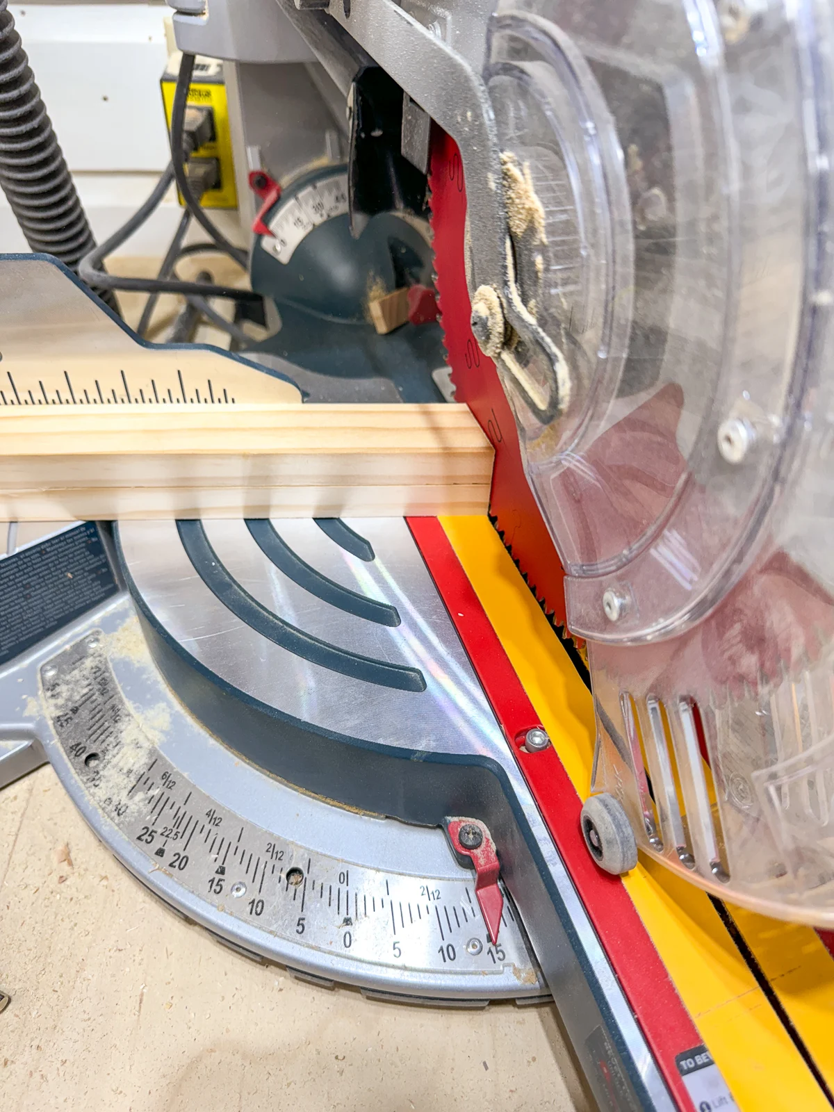 cutting the ends of the shelf support brackets at a 15 degree angle