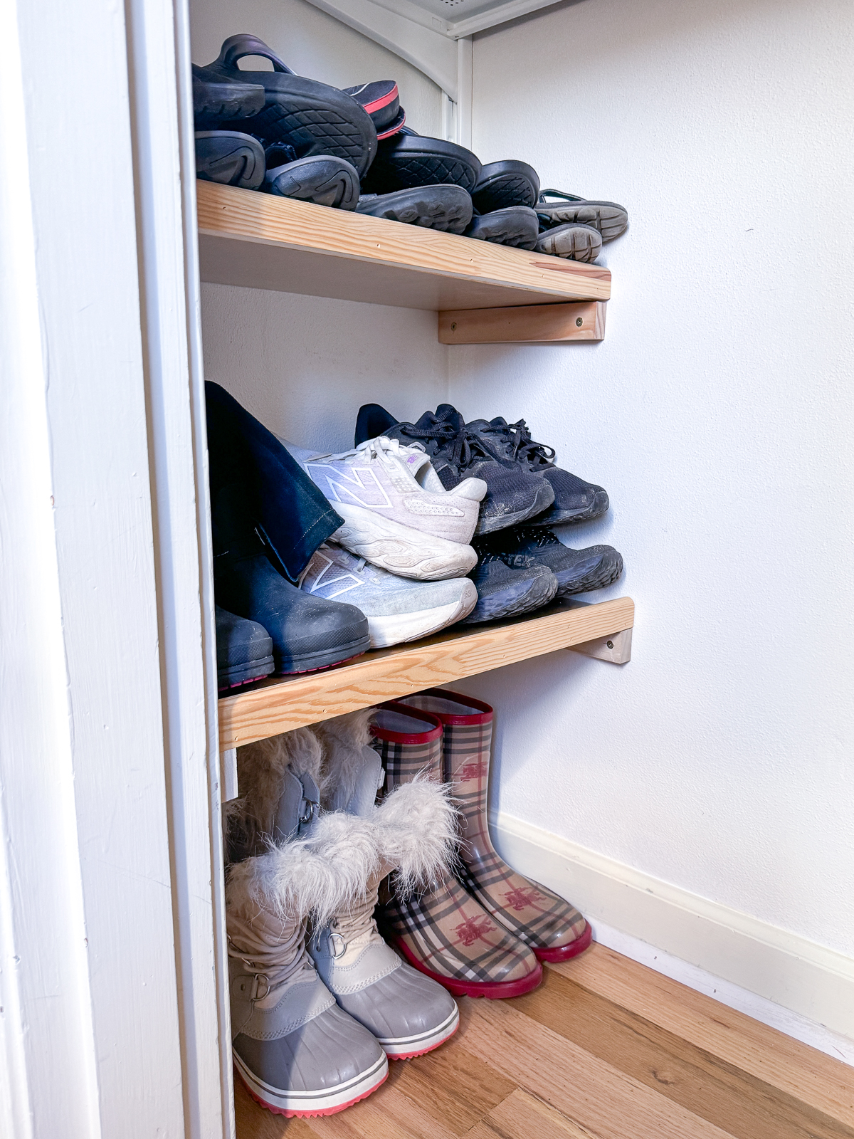 shoe shelves for boots, sneakers and sandals in closet