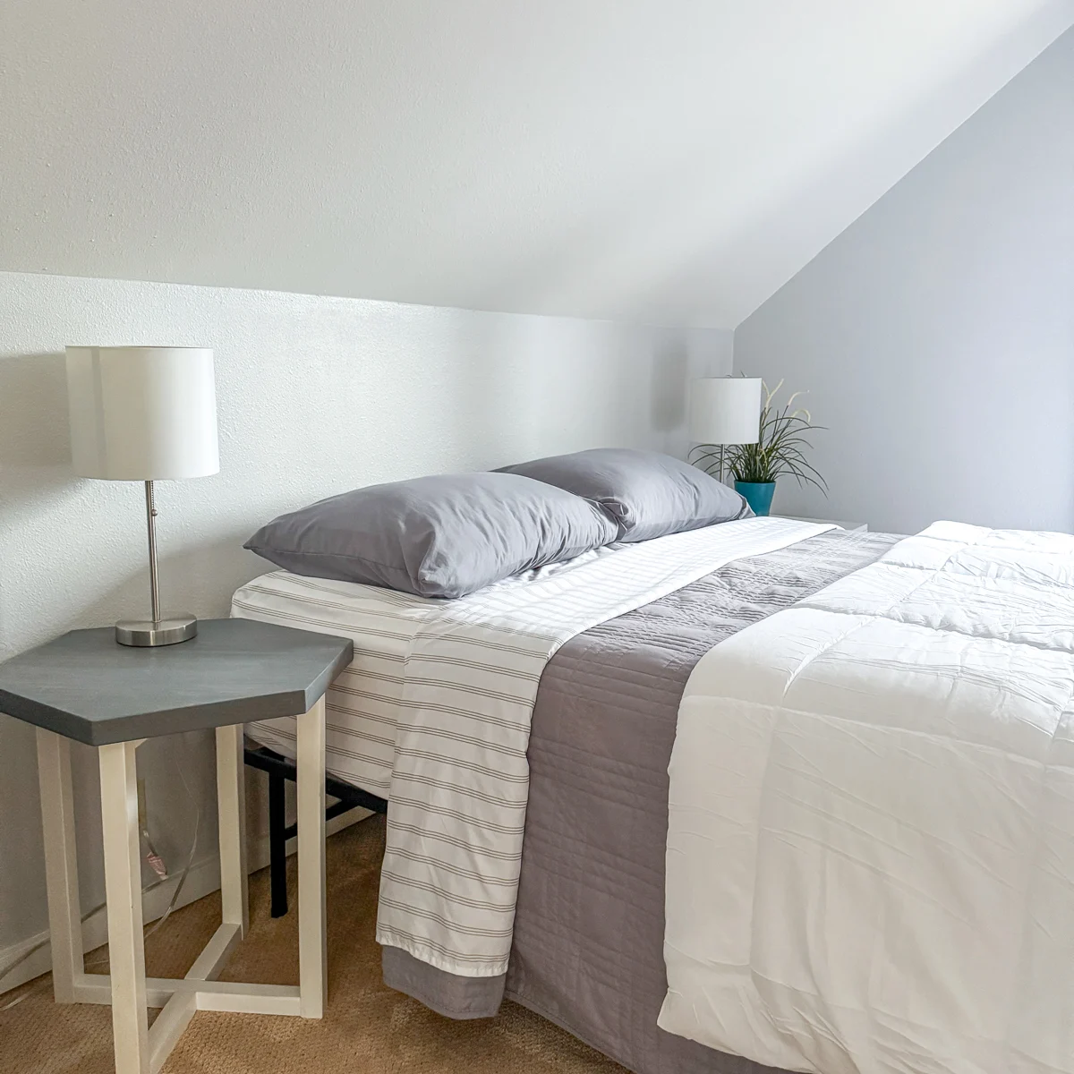 guest room bed before headboard is installed