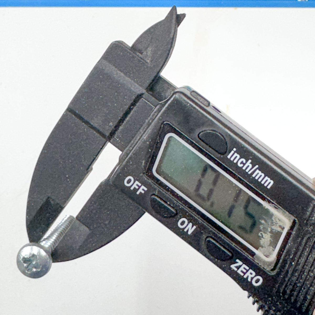 measuring a screw diameter with digital calipers