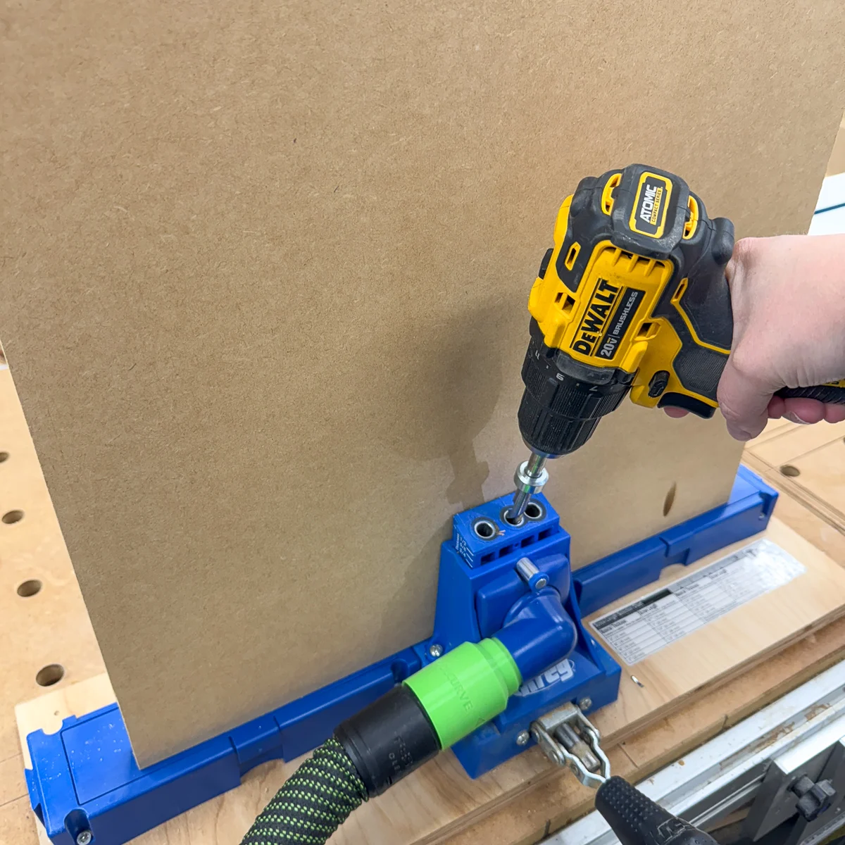 drilling pocket holes at the ends of the top and bottom panels of the 3d printer stand