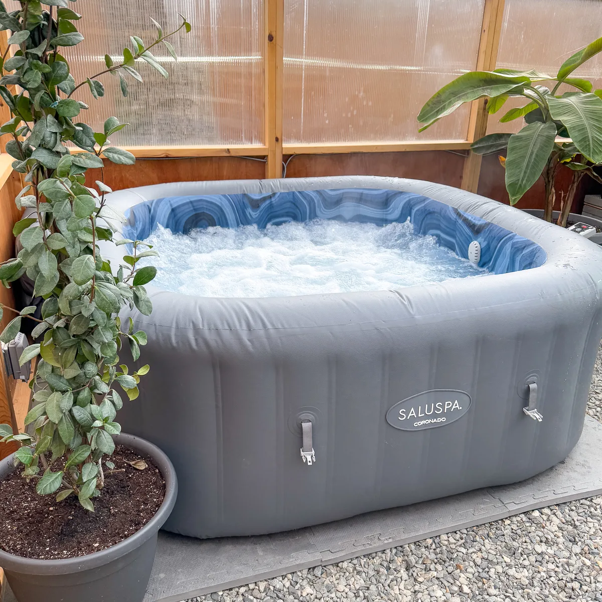 inflatable hot tub in the greenhouse