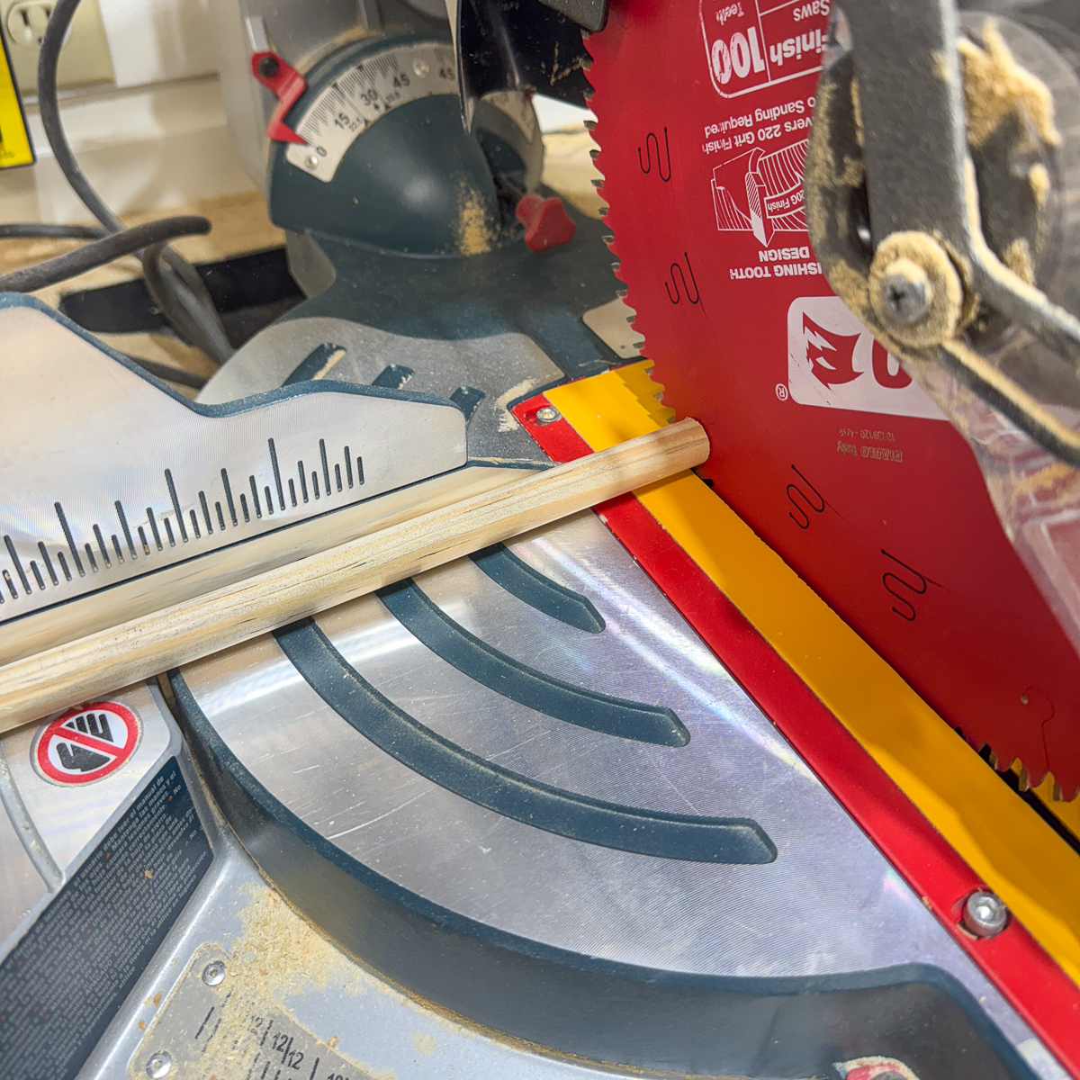 cutting dowels for filament storage rack with a miter saw